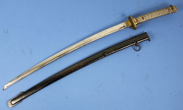 WWII Japanese Army Type 95 NCO Sword by Tokyo Arsenal with Matching Numbers and Bullet Damaged Scabbard - Image 2