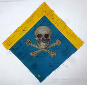 Signed WWII Skull and Crossbones Flag Fragment