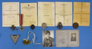Exceptional WWII German Medals and Documents Group with a Numbered "25" Panzer Assault Badge