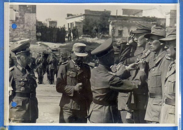 Official WWII German Photograph: A General Presides Over the Award of a Knight's Cross and Iron Crosses