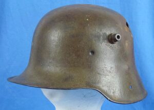 Battle Damaged WWI German Combat Helmet by Gebrüder Gnüchtel A.G.
