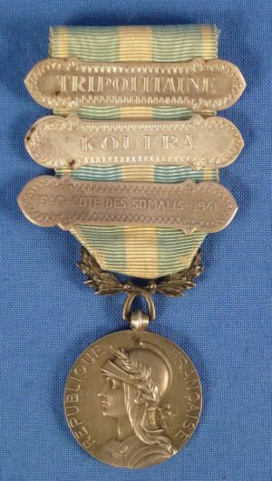 French Colonial Medal with Bars "TRIPOLITAINE," "KOUFRA," and "1940-COTE DES SOMALIS-1941"