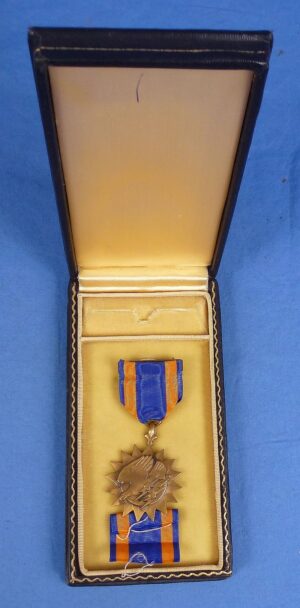 Cased WWII Air Medal with a Full Wrap Brooch Suspension