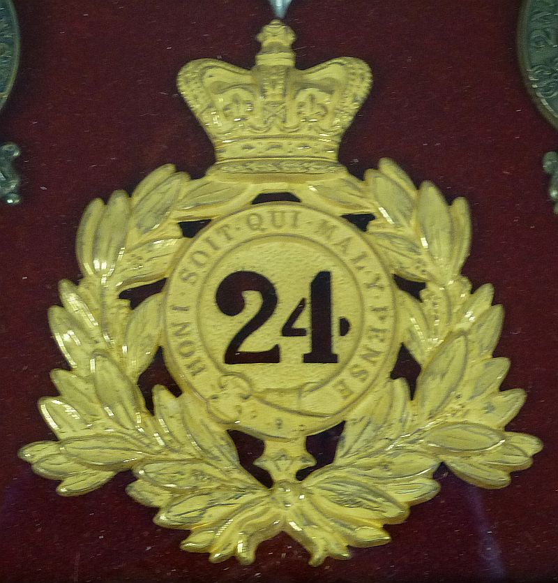 A Framed Display of British Badges of the 24th Foot South Wales Borderers of Rorke's Drift - Image 2