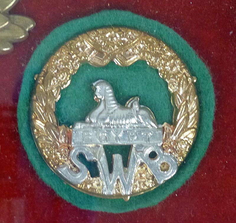 A Framed Display of British Badges of the 24th Foot South Wales Borderers of Rorke's Drift - Image 4